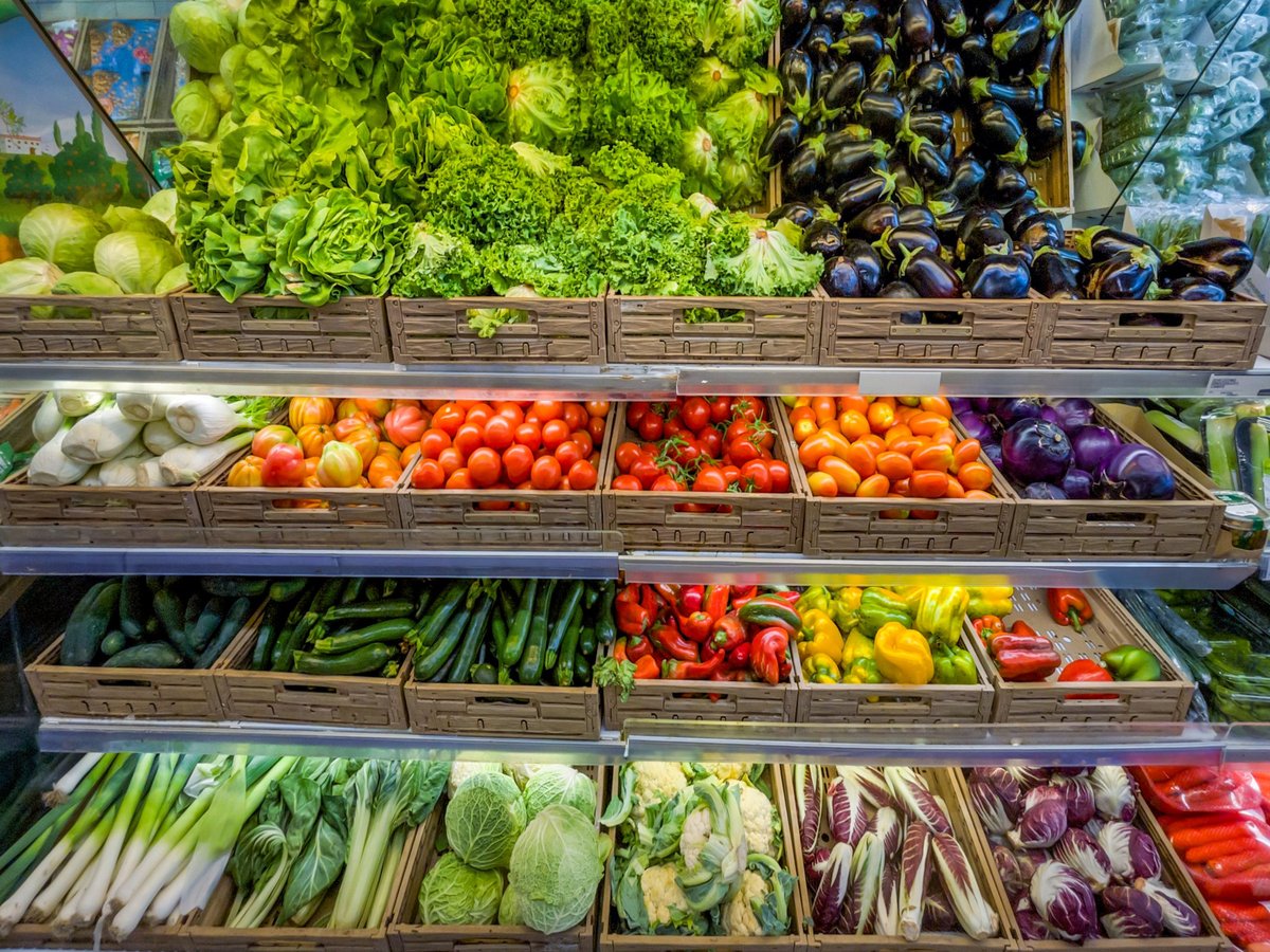 Fresh salad and vegetable bundles on supermarket shelves