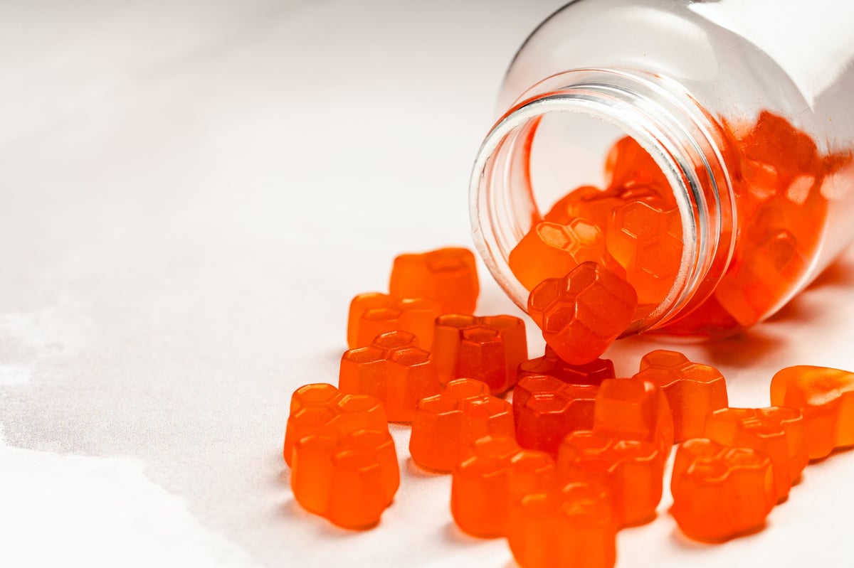 Orange jelly gummy vitamins close-up